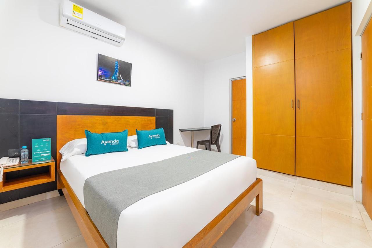 Ayenda Zhena Hotel กูกูตา ภายนอก รูปภาพ