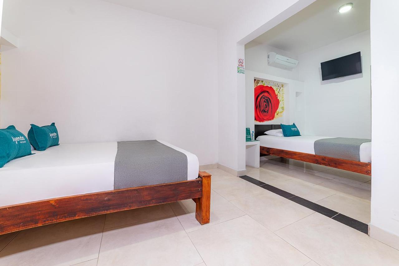 Ayenda Zhena Hotel กูกูตา ภายนอก รูปภาพ